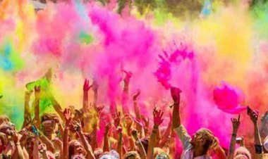 Why is Holi called festival of colours and what do red, pink, blue and green symbolise?